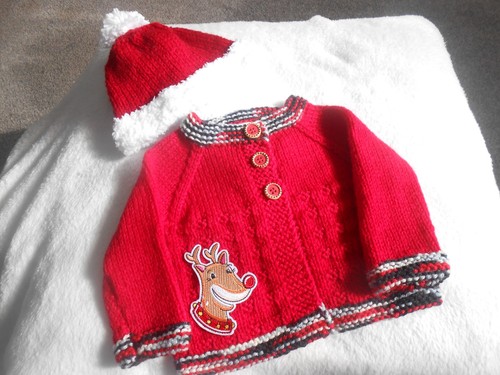 Hand knitted red xmas - hand,